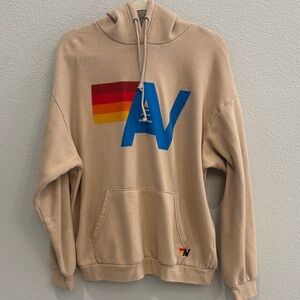 AV Logo Beige Hoodie - Blue & Multicolor Graphic